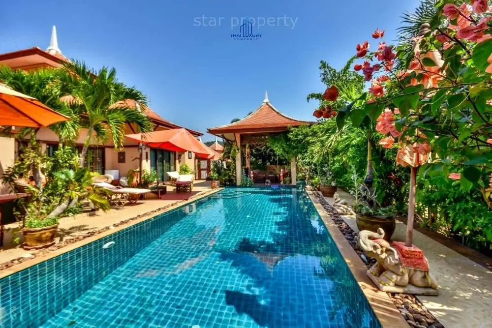 วิลล่าทรงไทย 7 ห้องนอนกว้างขวางพร้อมสระว่ายน้ำและสวนเขียวชอุ่มในสามร้อยยอด