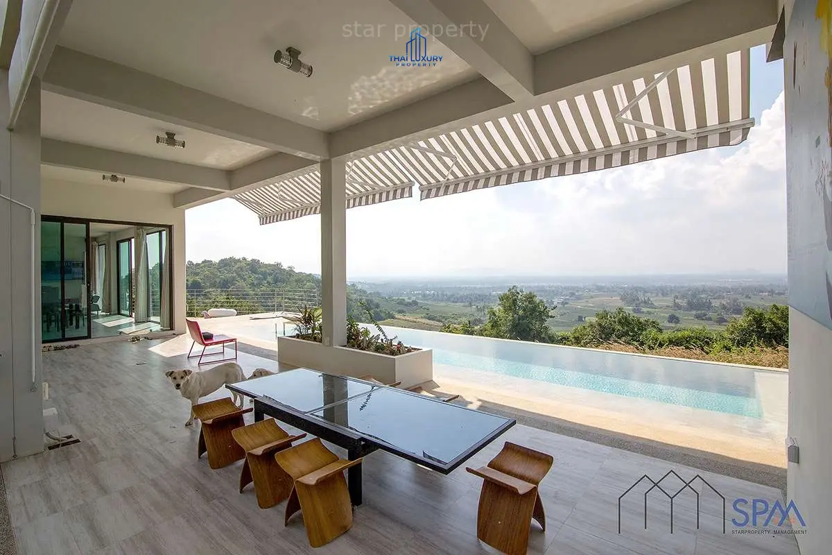 Modern 3-Bedroom Home with Infinity Pool and Stunning Hill Views