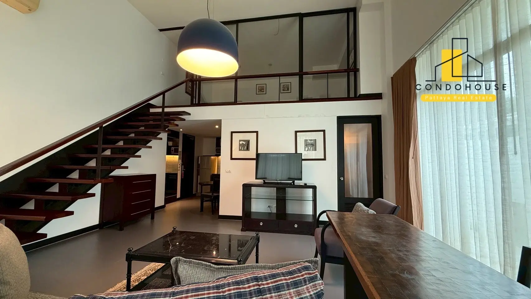 Cozy 1-Bedroom Duplex Condo with Loft & Rooftop Pool in Pattaya