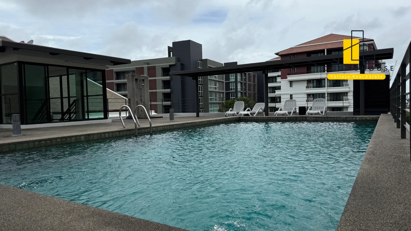 Cozy 1-Bedroom Duplex Condo with Loft & Rooftop Pool in Pattaya