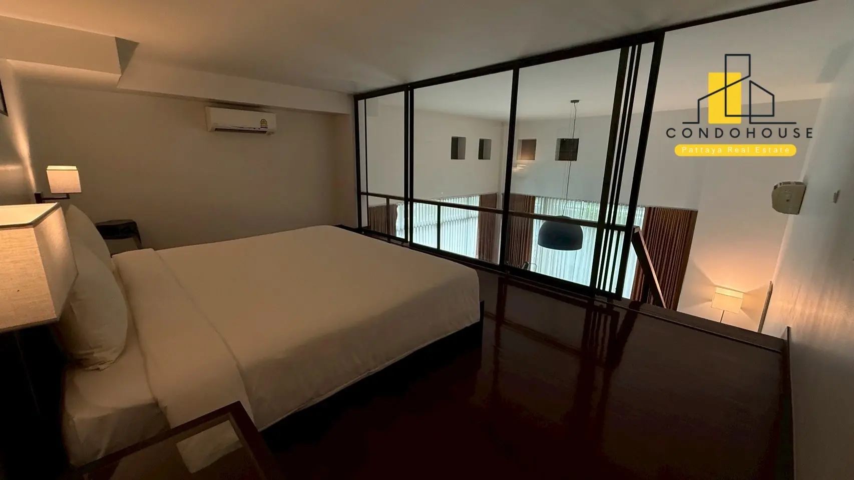 Cozy 1-Bedroom Duplex Condo with Loft & Rooftop Pool in Pattaya