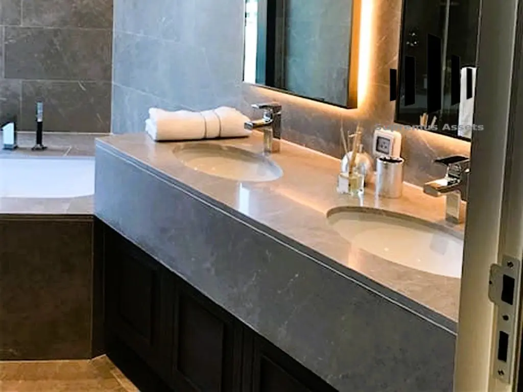 Spacious 3-Bed, 4-Bath Condo with Stunning City Views and High-End Finishes