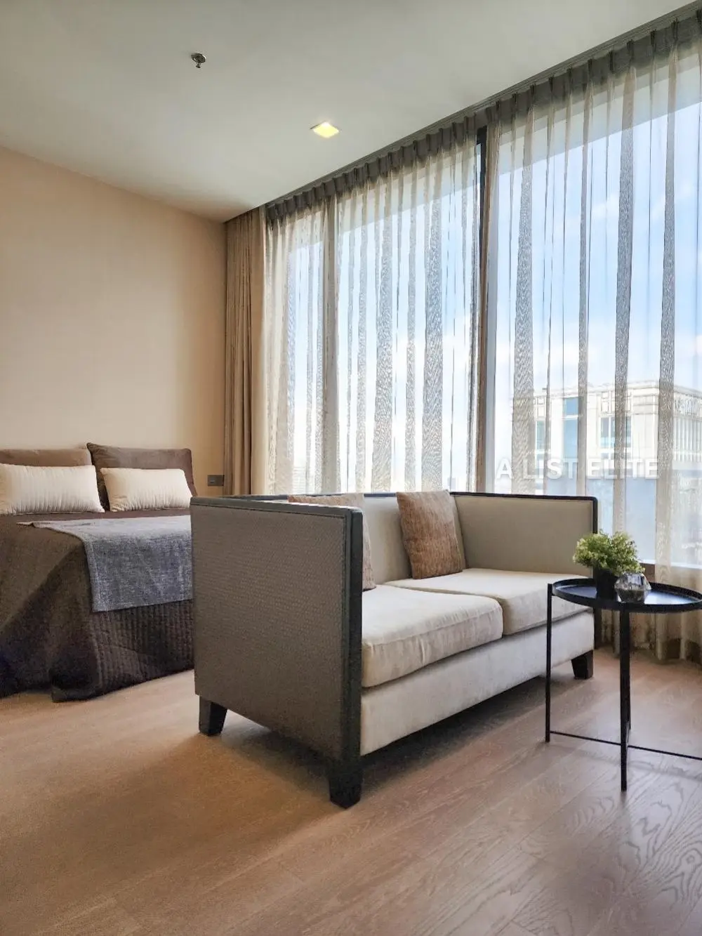 Sky-High Living: The ESSE Asoke - Exquisite 2 Bed Condo with Pool View