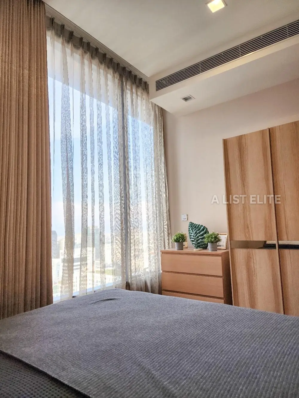 Sky-High Living: The ESSE Asoke - Exquisite 2 Bed Condo with Pool View