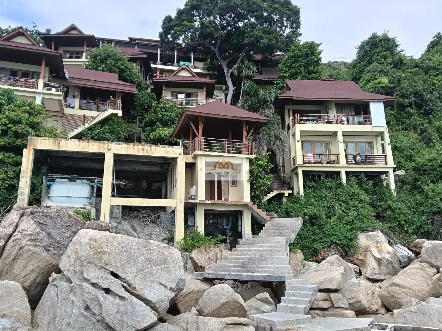 Sprawling 10-Bedroom Oceanfront Hotel with Stunning Hillside Views in Coral Cove