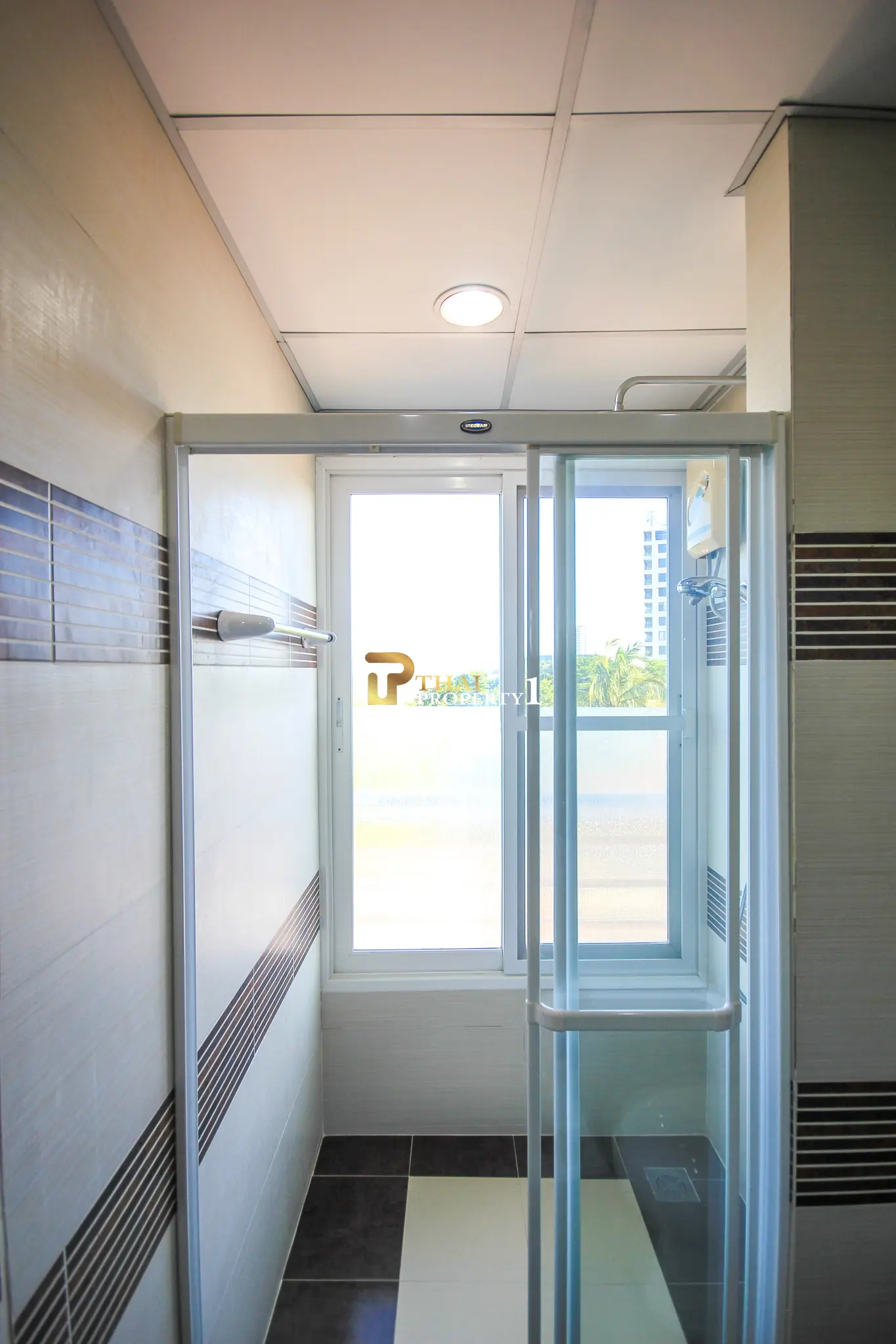 Beachfront 2-Bedroom Condo with Ocean Views and Multiple Balconies at Baan Hansa Condo Cha Am