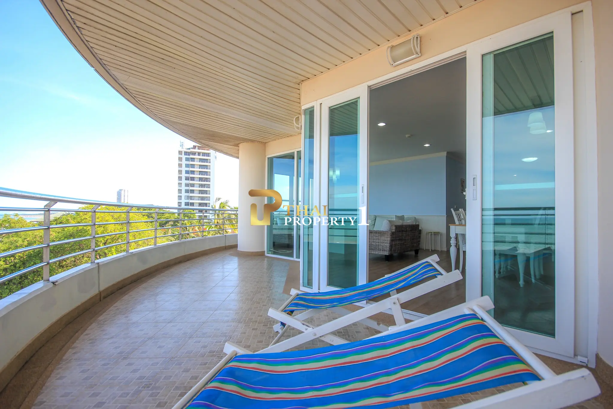 Beachfront 2-Bedroom Condo with Ocean Views and Multiple Balconies at Baan Hansa Condo Cha Am