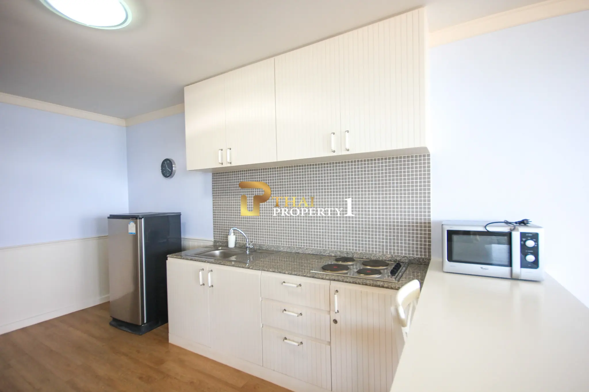 Beachfront 2-Bedroom Condo with Ocean Views and Multiple Balconies at Baan Hansa Condo Cha Am