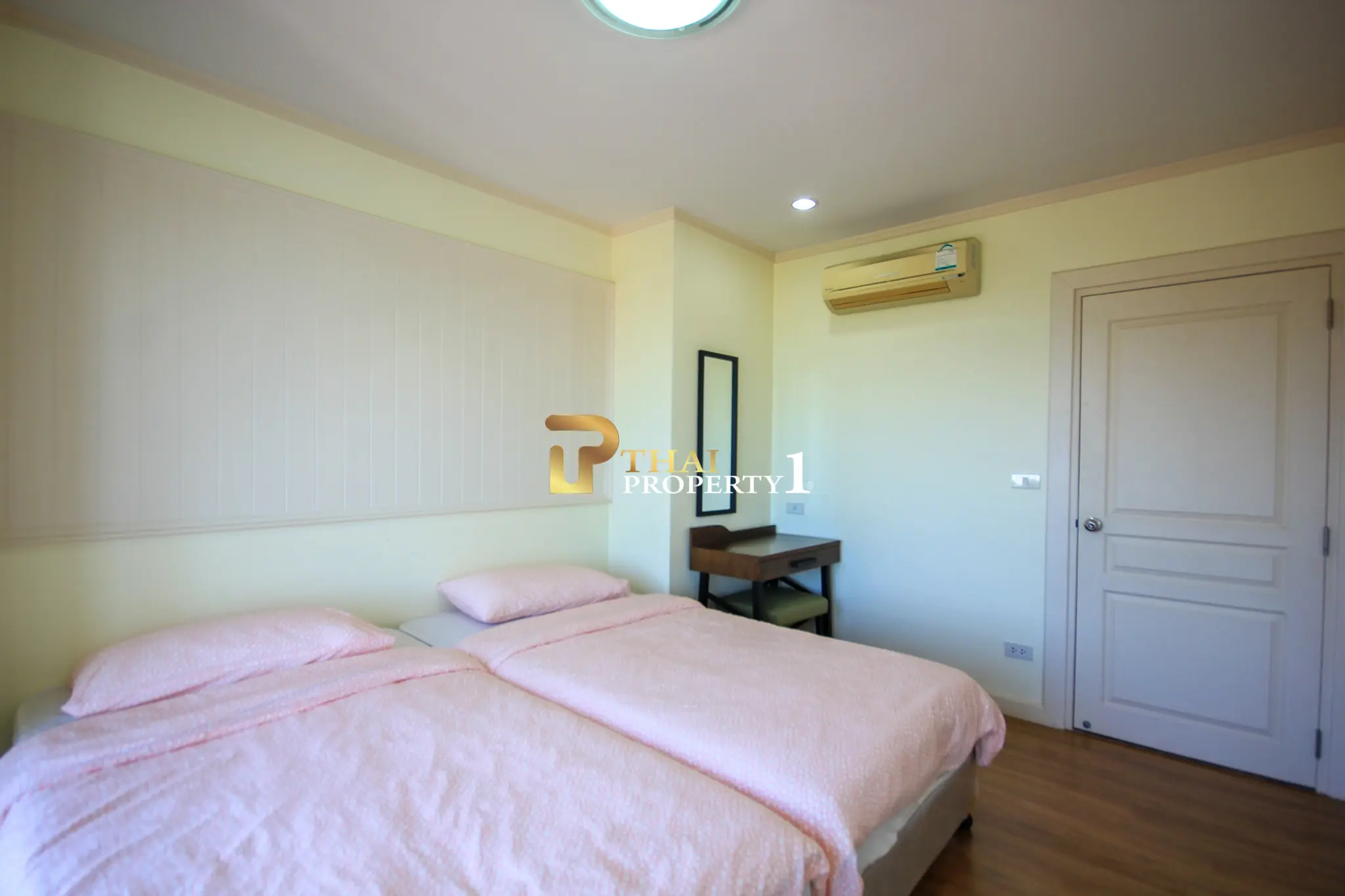 Beachfront 2-Bedroom Condo with Ocean Views and Multiple Balconies at Baan Hansa Condo Cha Am