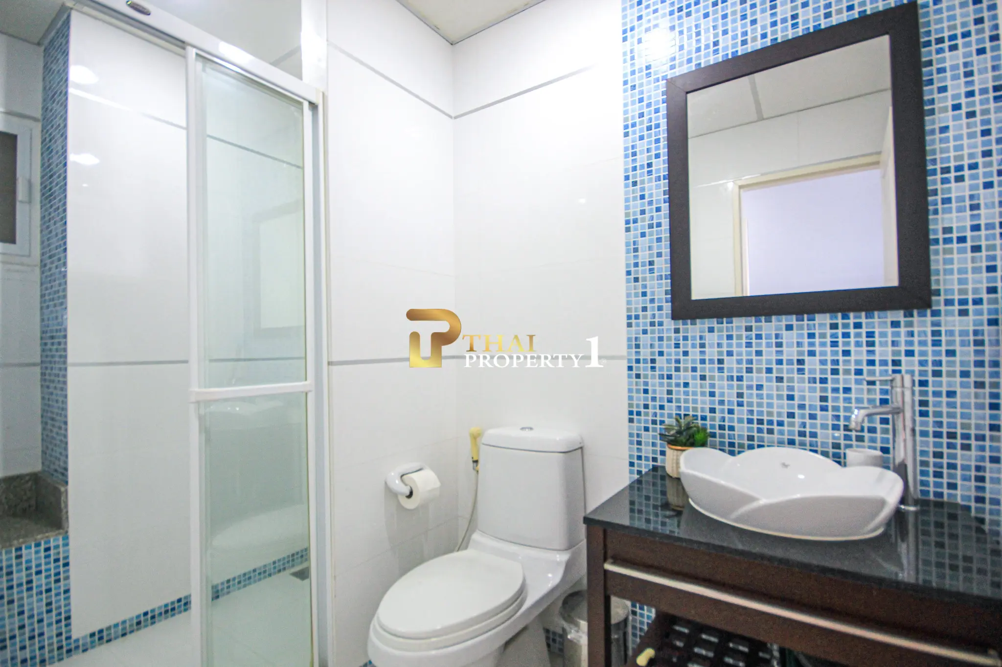 Beachfront 2-Bedroom Condo with Ocean Views and Multiple Balconies at Baan Hansa Condo Cha Am