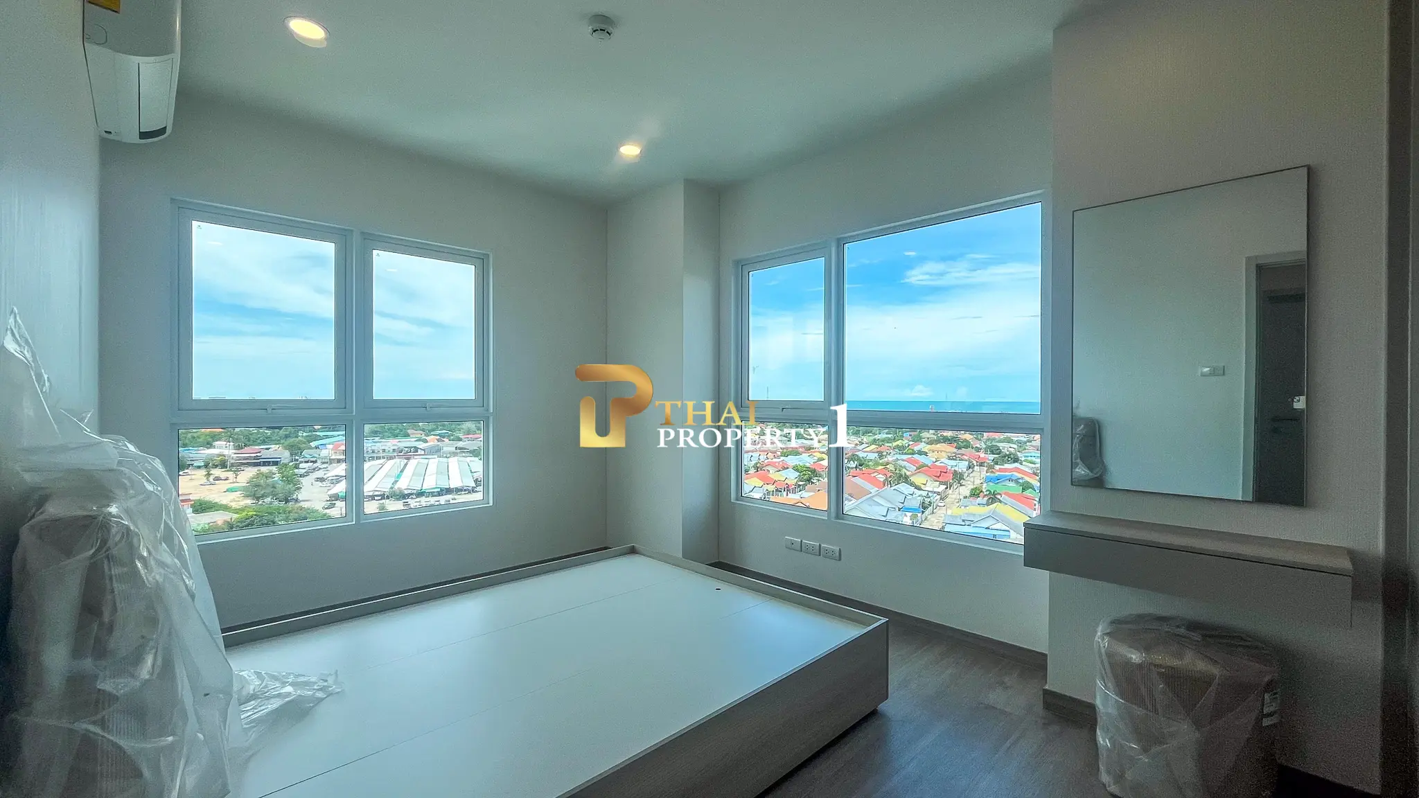 New 2-Bedroom Facing Stunning Ocean & City Views on 10th Floor At Blue Whale Condo Hua Hin