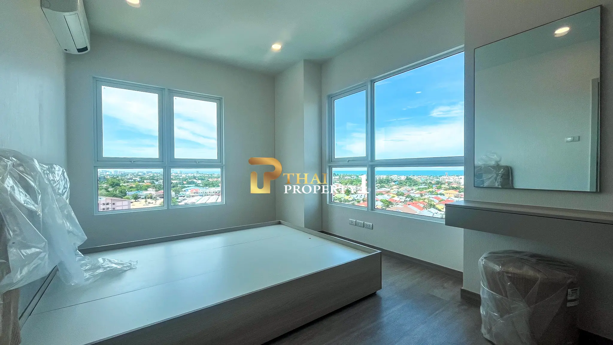 New 2-Bedroom Facing Stunning Ocean & City Views on 10th Floor At Blue Whale Condo Hua Hin