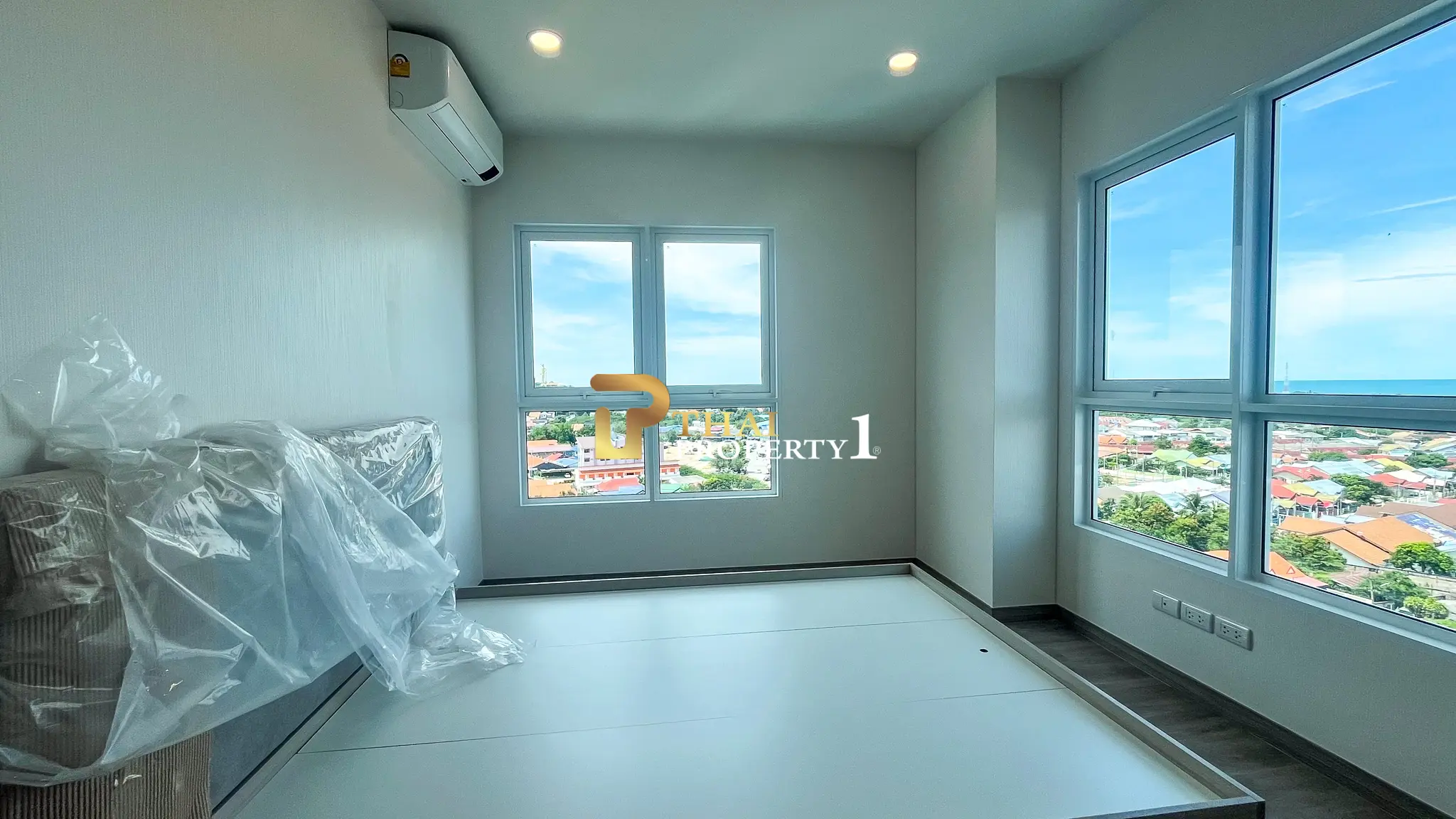 New 2-Bedroom Facing Stunning Ocean & City Views on 10th Floor At Blue Whale Condo Hua Hin