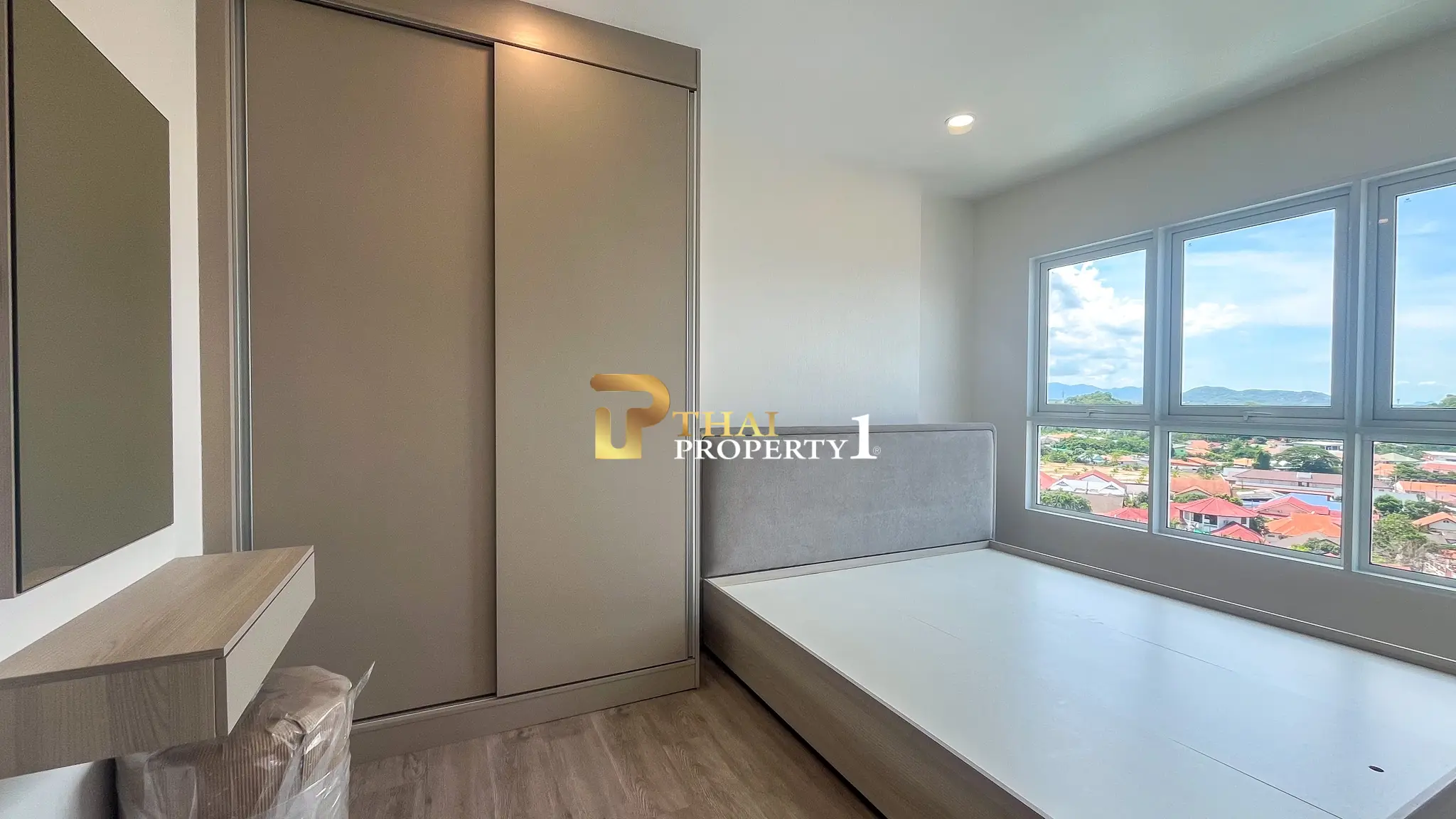 New 2-Bedroom Facing Stunning Ocean & City Views on 10th Floor At Blue Whale Condo Hua Hin