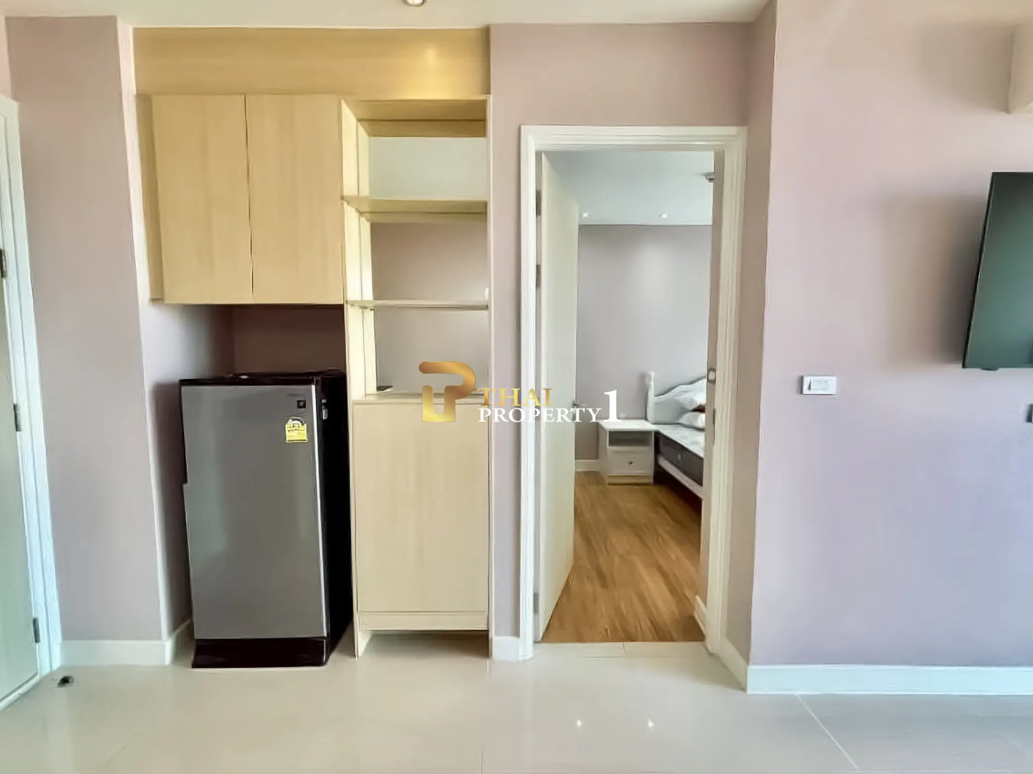 Leilighet med Bassengutsikt til Salgs i Jomtien – Grande Caribbean Condo Resort Pattaya