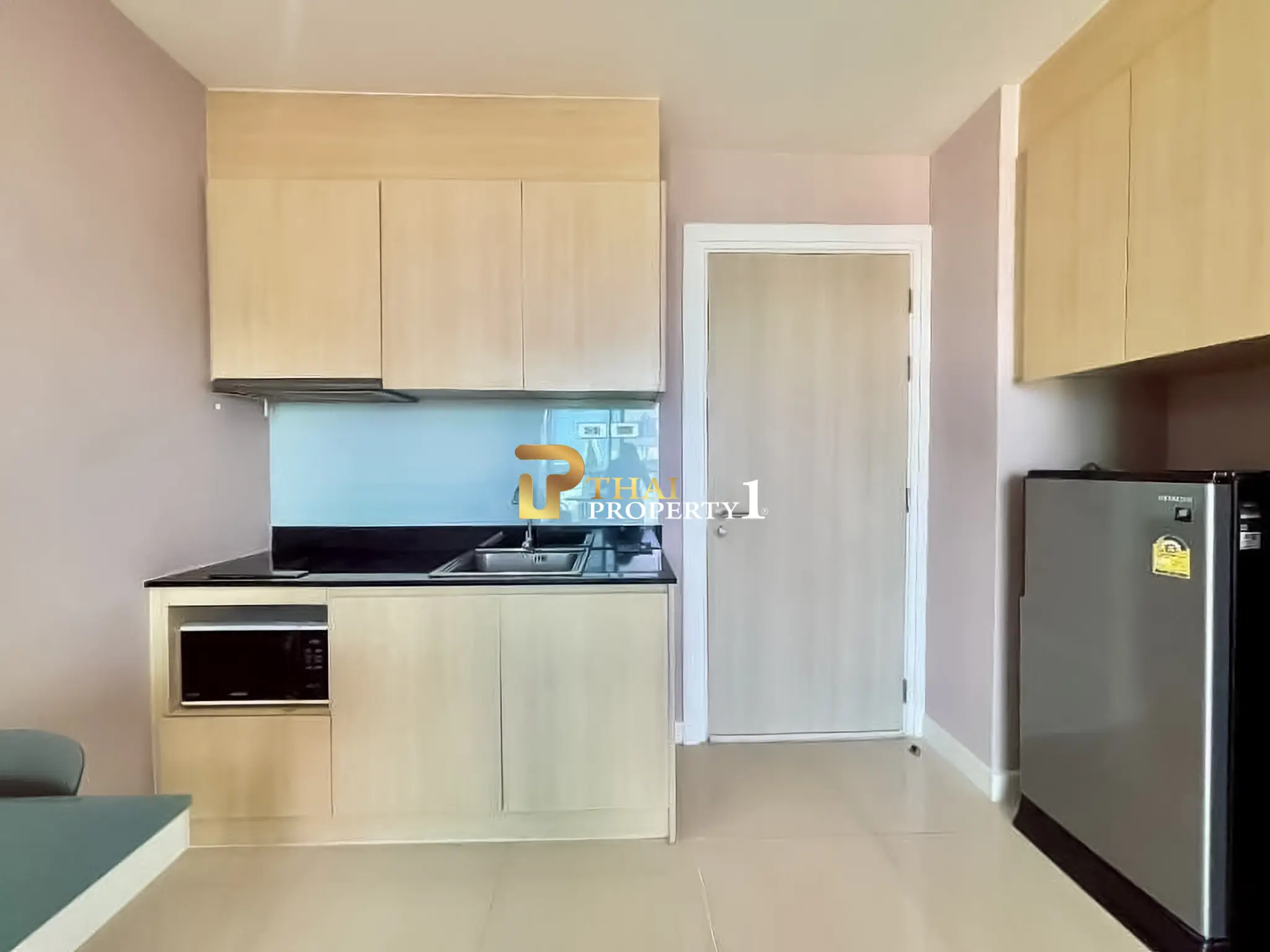 Leilighet med Bassengutsikt til Salgs i Jomtien – Grande Caribbean Condo Resort Pattaya