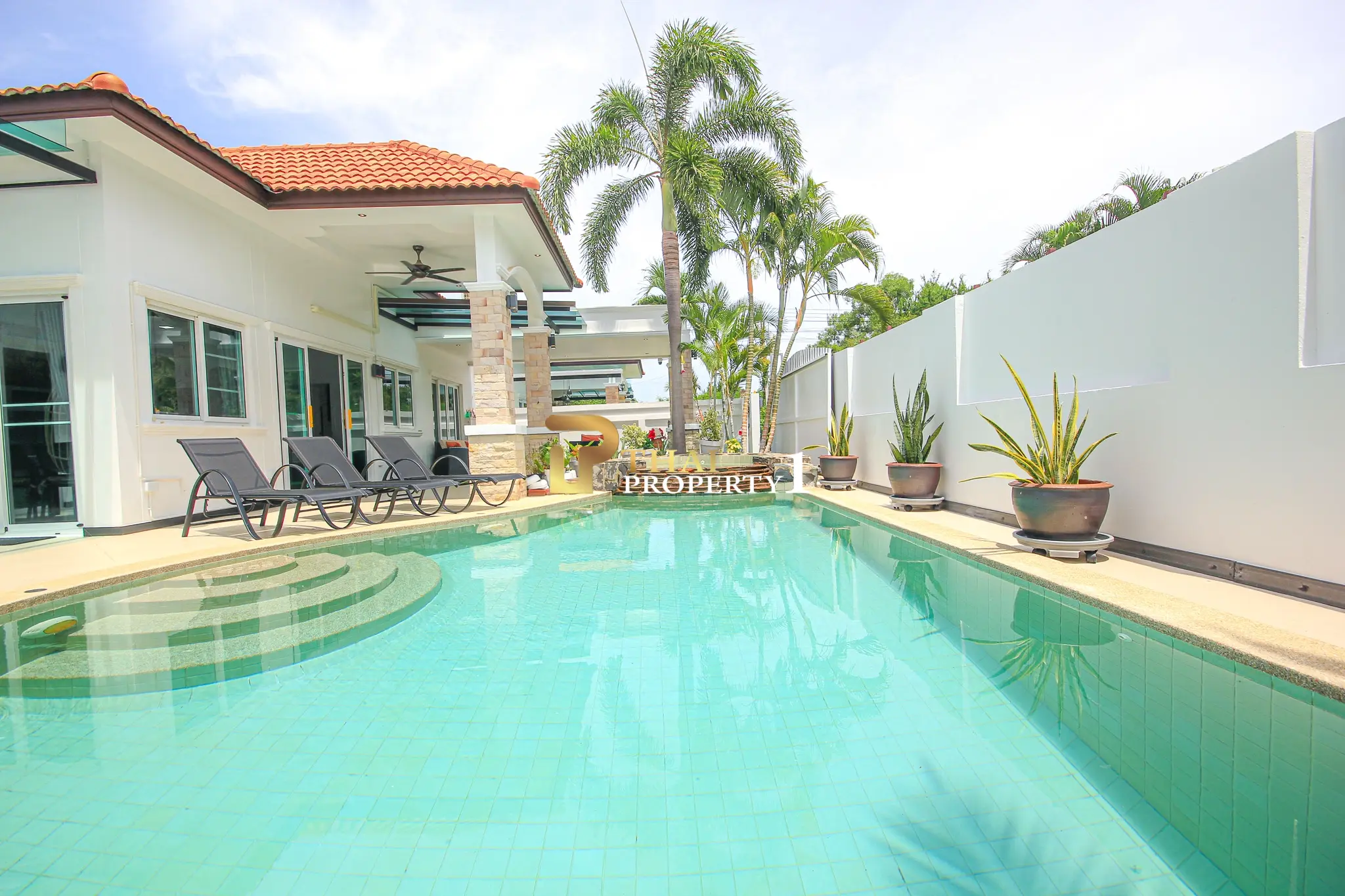 Relaxed Single-Story Villa with Private Pool and Modern Touches At Orchid Paradise Homes